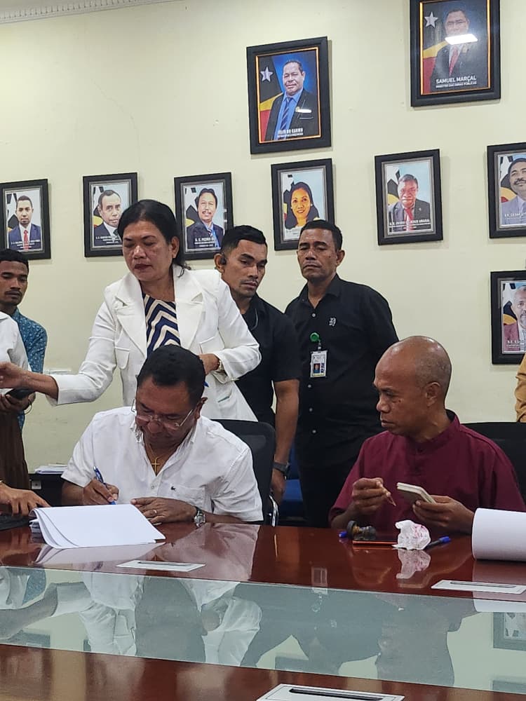 Signing ceremony of the Memorandum of Understanding (MoU) between Baywari Moris Found and the Ministry of Public Works of Timor-Leste, marking the official agreement for the Aileu road rehabilitation project.